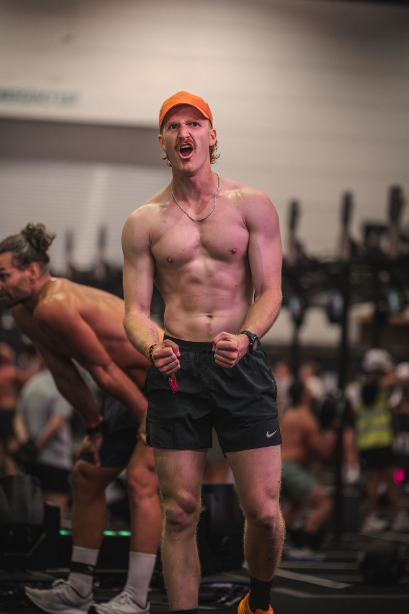 Luke celebrating mid-race